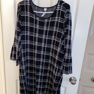 Black and white sweater dress with bell sleeves